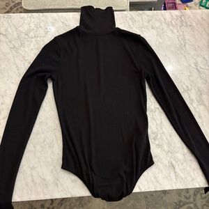 Free People black turtleneck fitted bodysuit